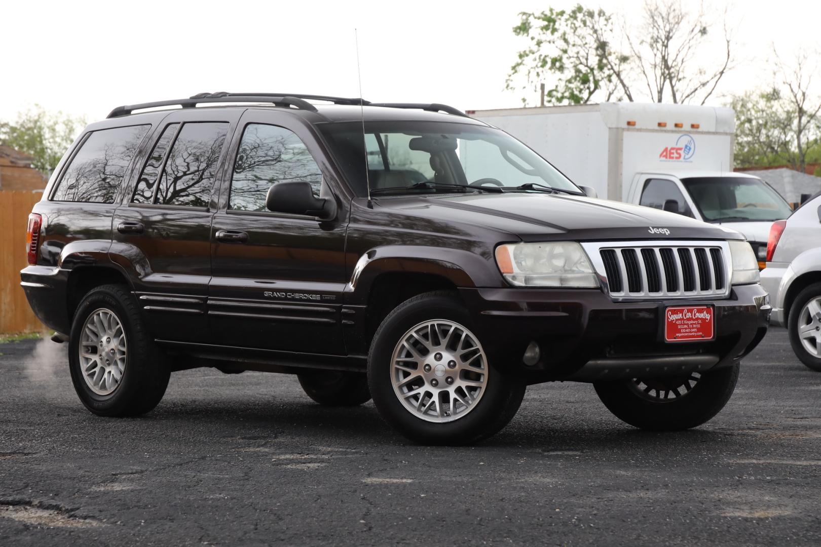 2004 PURPLE JEEP GRAND CHEROKEE Limited 2WD (1J8GX58N44C) with an 4.7L V8 SOHC 16V engine, 4-SPEED AUTOMATIC OR 5-SPEED AUTOMATIC transmission, located at 420 E. Kingsbury St., Seguin, TX, 78155, (830) 401-0495, 29.581060, -97.961647 - Photo#0